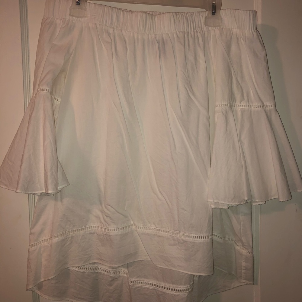 White off the shoulder high low shirt!